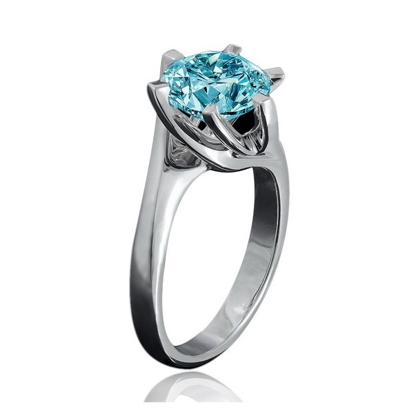 Золотое кольцо с голубым / синим бриллиантом из белого золота 0,64 ct. Diamant Stile 750°
Золотое кольцо с голубым / синим бриллиантом из белого золота 0,64 ct. Diamant Stile 750°