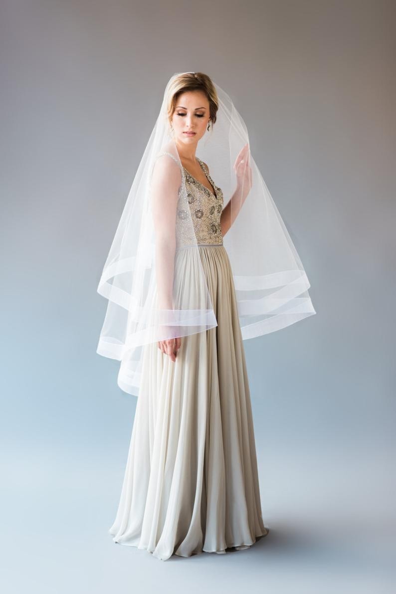 Двухслойная фата для невесты средней длины AdalineBride 140-150 см светлый айвори 20-52
Двухслойная фата для невесты средней длины AdalineBride 140-150 см светлый айвори 20-52