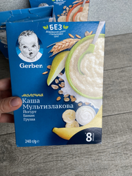 Дитяча каша Gerber Суха молочна швидкорозчинна Мультизлакова з йогуртом, бананом і грушею для дітей з 8 місяців 240 г (7613039834244) фото від покупців 16
