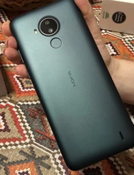Мобильный телефон Nokia C30 2/32 GB DS Green (286663573) фото от покупателей 11