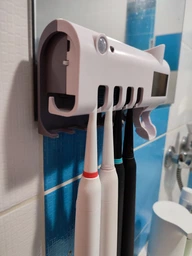 Настінний диспенсер для зубної пасти і стерилізатор для щіток Toothbrush sterilizer WJ3 фото від покупців 16