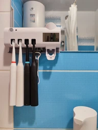Настінний диспенсер для зубної пасти і стерилізатор для щіток Toothbrush sterilizer WJ3 фото від покупців 15