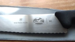 Кухонний ніж серейтор Victorinox Vx52033.19 Fibrox Carving 315 мм чорний фото від покупців 3