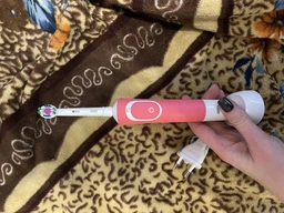 Электрическая зубная щетка Oral-B Vitality 3D White/D100 Pink (4210201262169_4210201234173) фото от покупателей 11