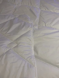 Ковдра Sleepingg всесезонна євро 200x220 см антиалергенне волокно Біла стьобана (4820227283194) фото від покупців 1