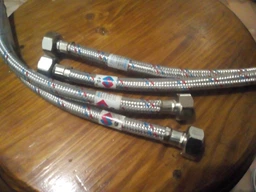 Шланг для підключення змішувача ZERIX ZX1571 зв-вн M10(LONG)x1/2" 30 см нержавіюче обплетення ZX1571 (пара)