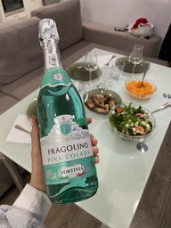 Напиток на основе вина Fortinia Фраголино Pina Colada голубой полусладкий 0.75 л (8018075001732) фото от покупателей 5