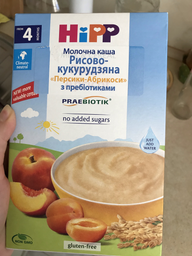 Молочна каша HiPP Рисово-кукурудзяна Персики-Абрикоси з пребіотиками 250 г (9062300113638_9062300140092) фото від покупців 2