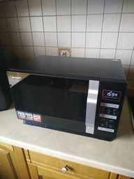 Мікрохвильова піч Sharp R360BK 900 Вт Чорна фото от покупателей 4