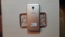 Мобильный телефон Meizu M3s 16GB Silver фото от покупателей 4