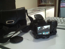 Фотоапарат Samsung WB100 Black (WB100ZBABRU)