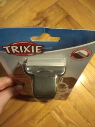 Расческа-триммер для собак Trixie для удаления подшерстка 6 х 15 см (4011905241838) фото от покупателей 3