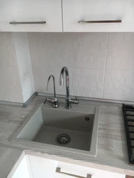 Кухонная мойка гранит GRANADO Merida black shine (0301) + сифон одинарный для кухонной мойки Nova фото от покупателей 9