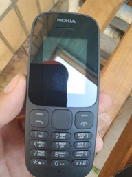 Мобільний телефон NOKIA 105 BLACK фото від покупців 7