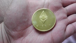 Монета сувенирная Ethereum цвет: золото фото от покупателей 3