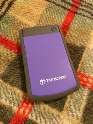 Внешний жесткий диск 2Tb Transcend StoreJet 25H3, Purple (TS2TSJ25H3P) фото от покупателей 8