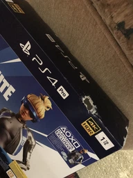 PlayStation 4 Pro 1TB Black (CUH-7208B) Bundle + Fortnite (код на скачивание предметов) + 2000 B-баксов (внутриигровой валюты) фото от покупателей 8