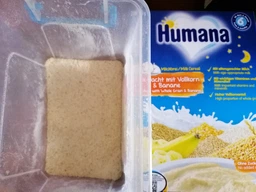 Дитяча каша Humana молочна Цільнозернова з бананом Солодкі сни 200 г (4031244775597) фото від покупців 4