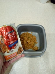 Корм консервований Purina One Mini/Small Adult для собак до 10кг з куркою морквою зеленою квасолею в підливі 85 г (8445290298263) фото від покупців 18