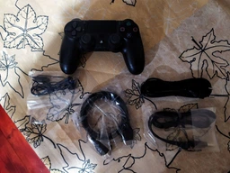 Ігрова приставка PlayStation 4 Pro 1TB Black у комплекті з 2 іграми (God Of War + Horizon Zero Dawn) фото від покупців 11