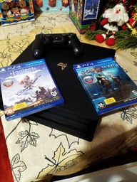 Ігрова приставка PlayStation 4 Pro 1TB Black у комплекті з 2 іграми (God Of War + Horizon Zero Dawn) фото від покупців 10