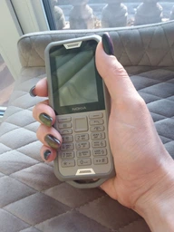Мобильный телефон Nokia 800 Desert Sand фото от покупателей 5