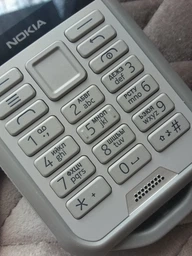 Мобильный телефон Nokia 800 Desert Sand фото от покупателей 10