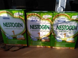 Смесь Nestle Nestogen 1 с рождения 700 г (7613031376001) фото от покупателей 19