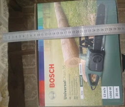 Цепная пила Bosch UniversalChain 35, 1.8 Квт, 35 см рабочая длина, цепь, кожух (06008B8303) фото от покупателей 15