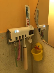 Диспенсер для зубной пасты и щеток автоматический Toothbrush sterilizer (W-020) , УФ-стерилизатор фото от покупателей 1