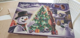 Шоколад Milka Адвент Календарь (Санта с санями) с 24 фигурками разных персонажей 200 г фото от покупателей 5