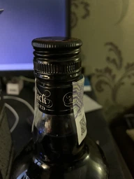 Ромовий напій Captain Morgan Spiced Black 0.7 л 40% + 2 чарки (4820178650533) фото від покупців 6