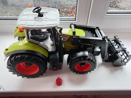 Спецтехника Bruder трактор Claas Axion 950 с погрузчиком (03013) фото от покупателей 4
