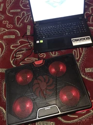 Охлаждающая подставка для ноутбука Crown CMLS-130 Black/Red фото от покупателей 5