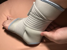 Бандаж для голеностопного сустава Wellcare 62021 1 шт (L) фото от покупателей 1