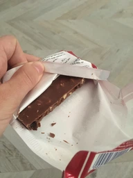 Шоколад Ritter Sport Молочный с ямайским ромом, изюмом и орехами 100 г (4000417012005/4000417601216)