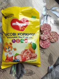 Рисовые коржики Milupa с грушей и ягодами для питания детей от 7-ми месяцев 40 г (8720097005291) фото от покупателей 1