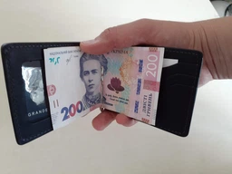 Зажим для денег кожаный Grande Pelle leather-11240 Коричневый фото от покупателей 14