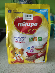 Каша Milupa молочна гречана з яблуком для дітей від 6 місяців 210 г (5900852054754) фото від покупців 1