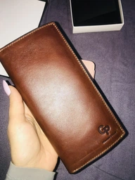 Вертикальне шкіряне портмоне унісекс GRANDE PELLE 11556 Синій фото від покупців 3