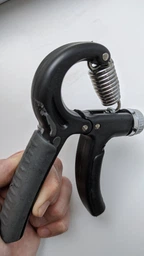 Кистьовий пружинний еспандер EasyFit Hand Grip 5-60 кг сірий (ручний пружинний тренажер з регульованим навантаженням) фото від покупців 1