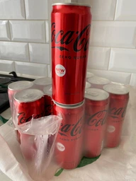 Упаковка безалкогольного напитка Coca-Cola ZERO 0.33 л х 12 банок (5449000131805) фото от покупателей 7