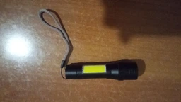 Ручний ліхтар Bailong BL-520 фото від покупців 2