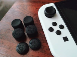 Силиконовые накладки на стики Honson для Nintendo Switch черный 8 шт