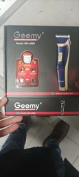 Беспроводная аккумуляторная машинка для стрижки волос Geemy GM-6005 триммер для волос, бороды и усов фото от покупателей 5