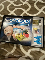 Настільна гра Монополія/Monopoly від HASBRO з електроним банкінгом Українська версія фото від покупців 4