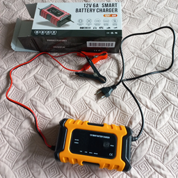 Зарядний пристрій для автомобільного акумулятора Foxsur 12V 6A фото від покупців 2