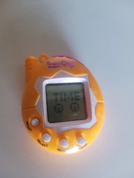 Тамагочі класичний Tamagotchi (жовтий)