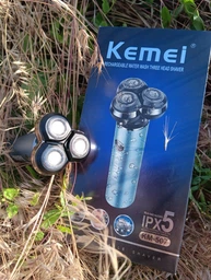 Чоловіча акумуляторна електробритва Kemei KM-507 для вологого і сухого гоління з трьома плаваючими головками фото від покупців 1