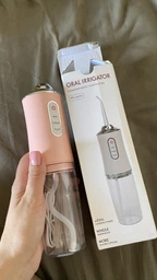 Ирригатор портативный ORAL IRRIGATOR для полости рта фото от покупателей 1